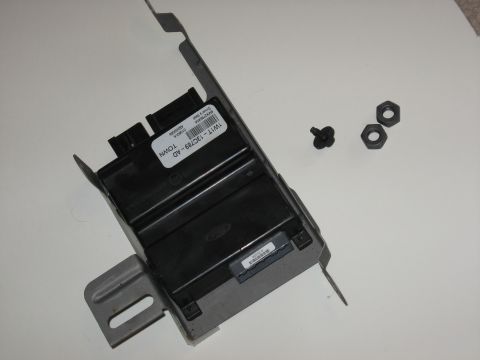 2001 Ford Crown Victoria - Ford electronic control module, part number 1W1T-13C789-AD, with fasteners.