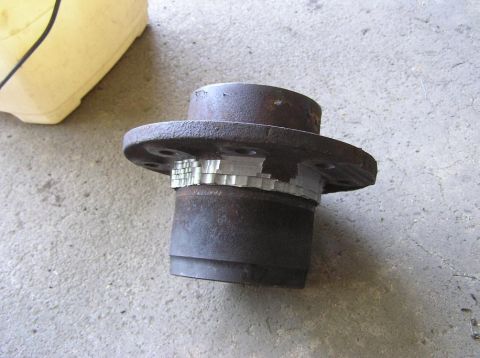 2000 Chevrolet Tahoe - A rusty wheel hub with a segmented ABS ring is shown, with tape applied to parts of the ring.