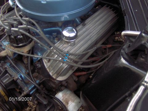 1964 Ford Ranchero - Close-up view of an engine bay, chrome valve covers and a blue air cleaner. The date 01/19/2007 is visible.