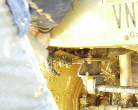 1989 Ford Bronco - bent front hook attached to chassis after hitting mud pit a little too hard!