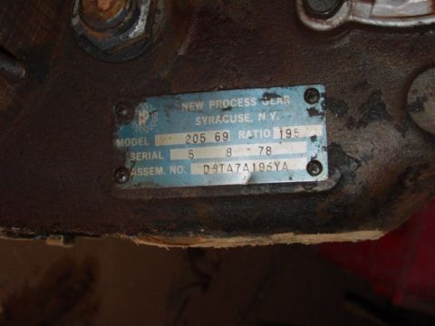 1986 Ford Bronco - A close-up view of a metal data plate showing manufacturing information and serial information.