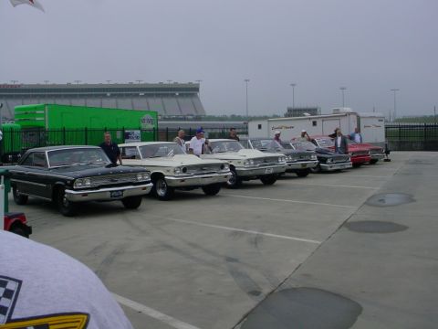 1972 Ford Ranchero - Several classic Ford Galaxies are parked in a row at what appears to be a car show or race track event.