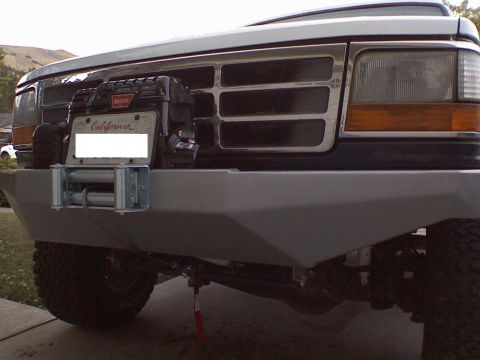 1994 Ford Bronco - Front view of a 1994 Ford Bronco an aftermarket bumper and winch assembly.