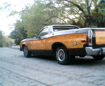 1973 Ford Ranchero - Rear view of a 1973 Ford Ranchero Squire pickup truck wood paneling.