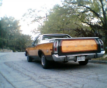 1973 Ford Ranchero - This 1973 Ford Ranchero pickup has a distinctive wood-grain applique on its tailgate.