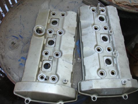 1992 Ford Taurus - Two engine valve covers are shown, likely for a V-engine configuration, with visible numbering on one.