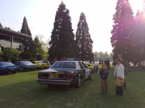 1991 Ford Crown Victoria - Highway Patrol Crown Victoria parked at an outdoor event with other classic cars.
