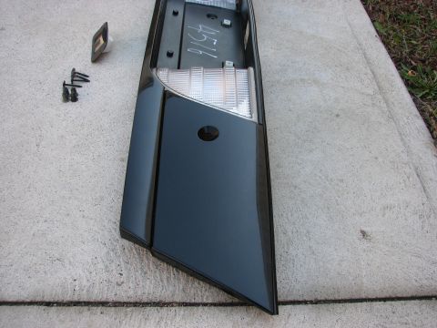 2003 Ford Crown Victoria - Car tail light assembly with clear lens and mounting hardware visible. Part number 4516 written on back.