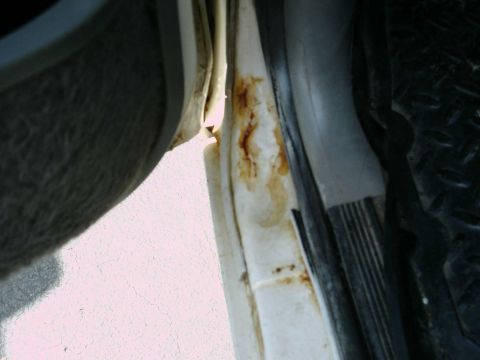 1988 Ford Bronco - Rust is visible on the interior door jamb, indicating potential corrosion issues.