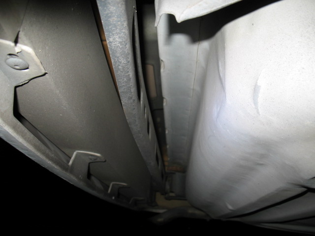 Underside view of vehicle frame rails and body panels