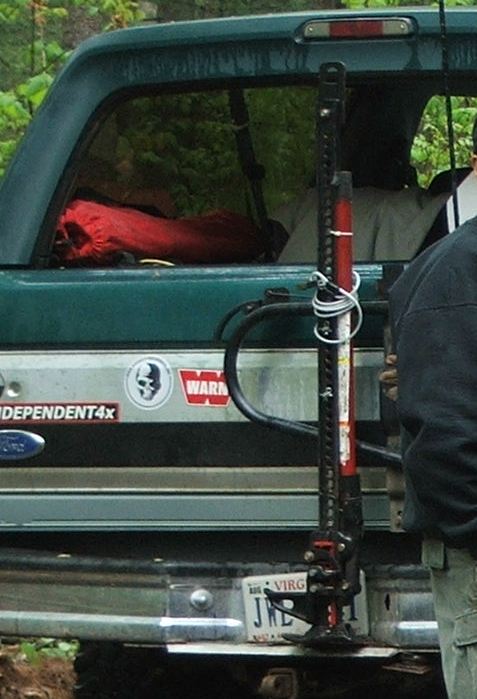 1996 Ford Bronco - Rear view of a 1996 Ford Bronco, equipped with a hi-lift jack and a Warn sticker.
