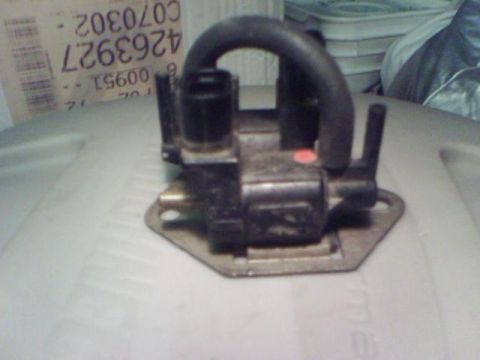 1993 Ford Probe - Close-up of an automotive part with a visible part number.