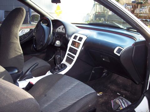 1993 Ford Probe - Interior view of a 1993 Ford Probe, highlighting the dashboard and seating areas.