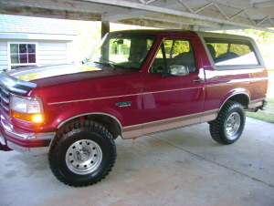 1994 Ford Bronco - This red Ford Bronco appears to be a 1992 model, not the claimed 1994.