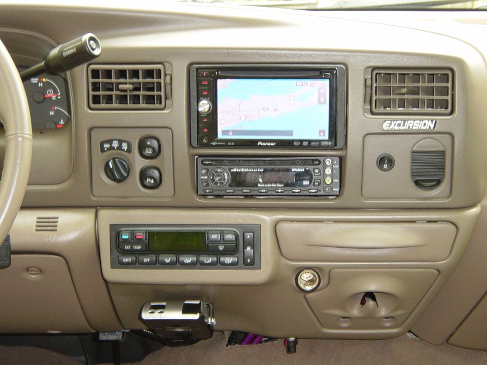 Ford Excursion dashboard with aftermarket Pioneer navigation head unit