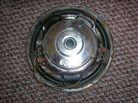 1994 Ford Probe - A close-up view of a car audio speaker, showing its model number and brand markings.