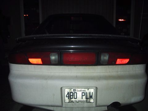 1993 Ford Probe - Rear view of a 1993 Ford Probe GT, showing its distinctive taillights and spoiler.