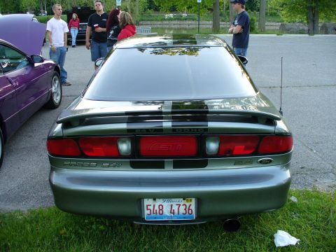 1991 Ford Probe - This 1991 Ford Probe GT features a distinctive rear design with racing stripes and a prominent GT badge.
