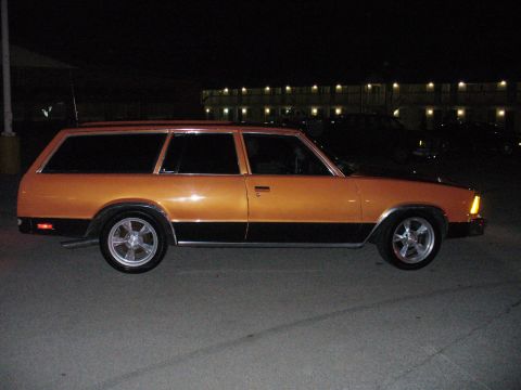 1991 Ford Probe - This two-tone station wagon features a classic body style, likely from the late 1970s.