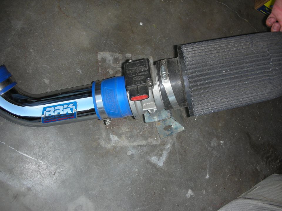 Close-up of BBK intake pipe, MAF sensor, and cone filter on floor