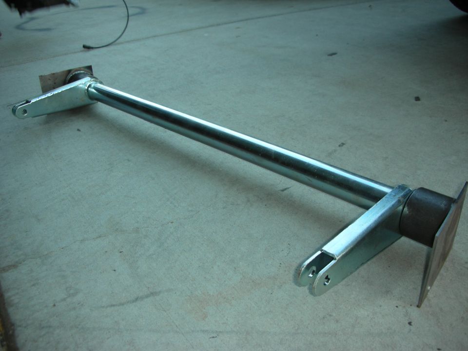 Metal suspension part with two mounting points and a central bar
