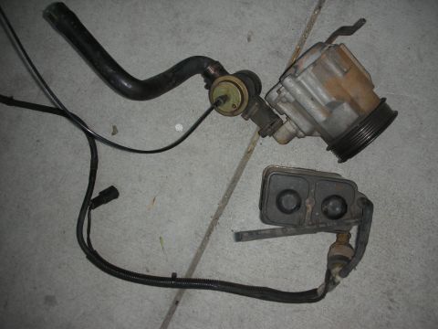 1998 Ford Crown Victoria - Power steering pump and fluid reservoir assembly for sale.