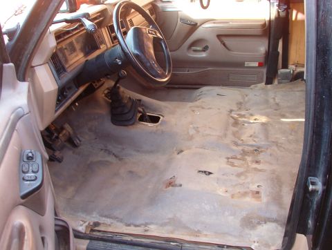 1983 Ford Bronco - I'm planning on swapping transmissions soon anyway, so I pulled the seats & console to check out the floor.