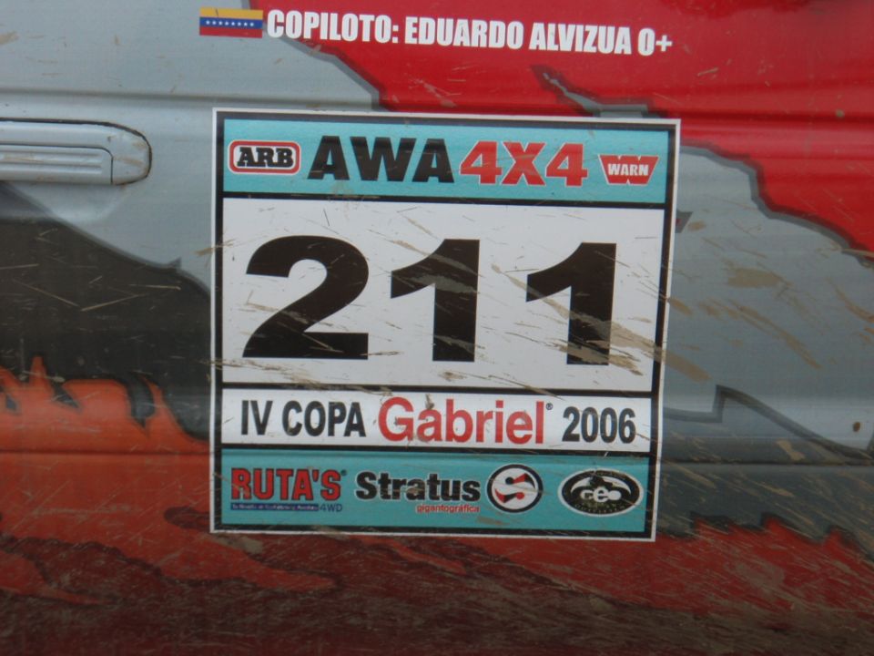 Racing decal with number 211 and 'IV COPA Gabriel 2006' on a vehicle door
