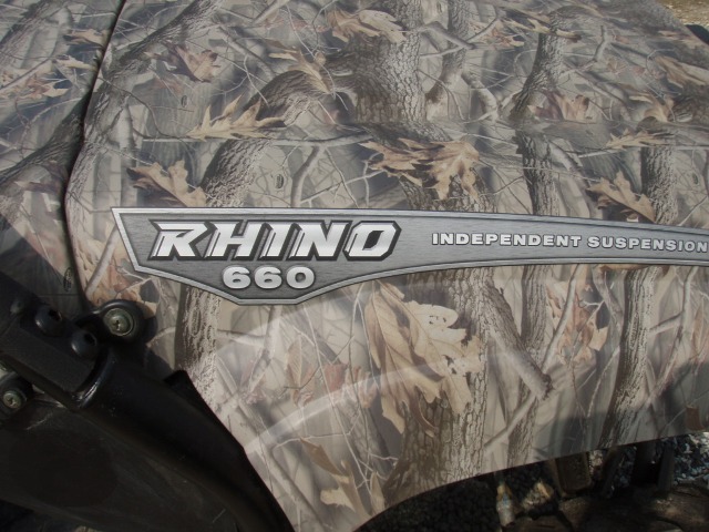 Camo-covered Yamaha Rhino 660 side panel with 'Independent Suspension' text