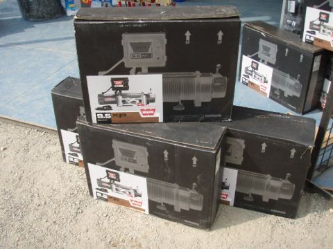 1995 Ford F-150 - Multiple boxes of Warn 9.5XP winches are displayed, showing the product packaging.