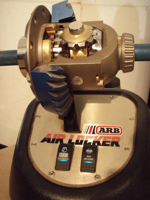 1995 Ford F-150 - Close-up of an ARB air locker differential part with visible gears and control switches.