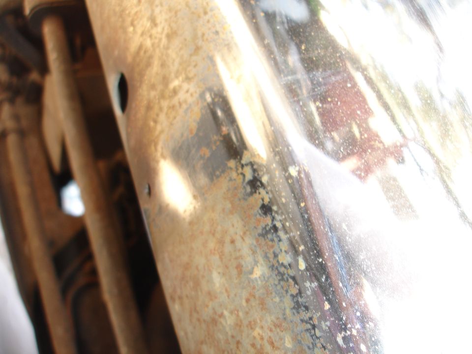 Chrome bumper with rust and dirt