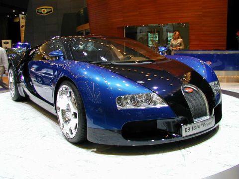 1991 Ford Probe - A blue and black Bugatti Veyron is displayed with a nameplate reading "EB 18/4 "Veyron"".