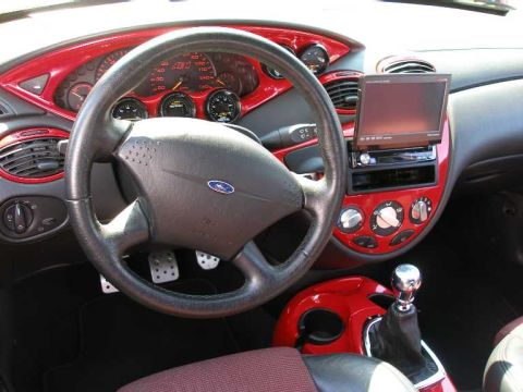 1998 Ford Crown Victoria - Customized car interior with red accents on the dashboard and center console.