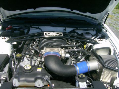 2007 Ford Mustang - Engine bay of a 2007 Ford Mustang GT, an aftermarket cold air intake system.