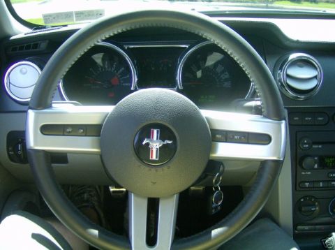 2007 Ford Mustang - Interior view of a 2007 Ford Mustang, highlighting the steering wheel and dashboard.
