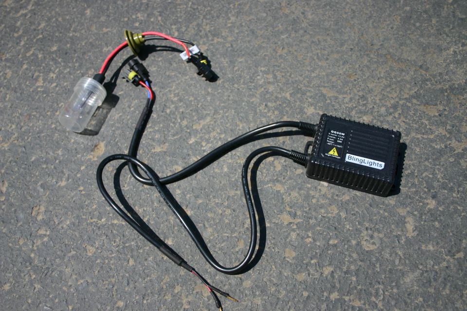 HID ballast and bulb assembly on asphalt
