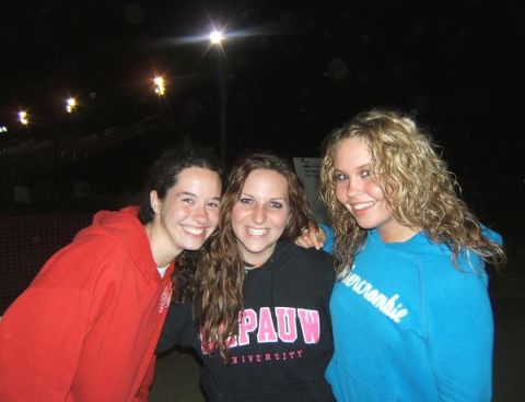 1995 Ford Probe - Three women pose for a photo at night, with stadium lights in the background.