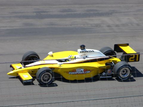 1991 Ford Probe - Side view of a Honda-powered IndyCar race car on a track.