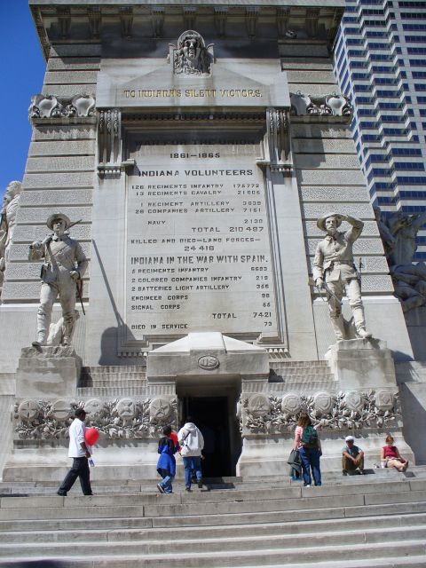 1991 Ford Probe - A monument dedicated to Indiana Volunteers features inscriptions and statues of soldiers, with people walking up the steps.