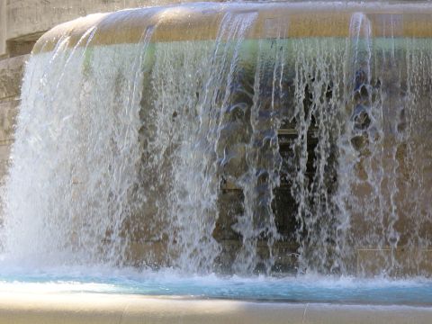 1991 Ford Probe - A close-up view of a waterfall cascading over a stone structure, with the SuperMotors logo visible at the bottom right.