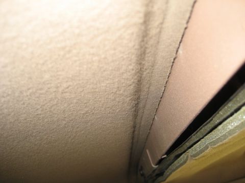 1995 Ford Bronco - Interior view showing headliner fabric and trim panel detail.
