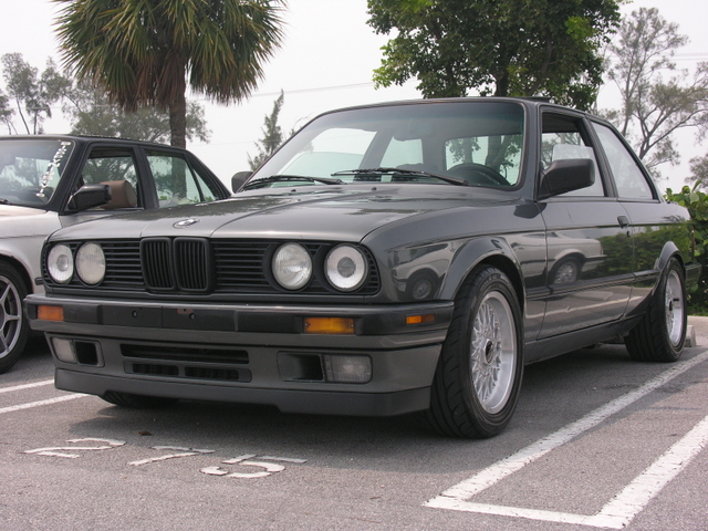 1989 BMW 3 Series coupe parked in a lot, front 3/4 view