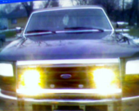 1901 Honda Odyssey - This van's front grille and headlights are prominently displayed in this frontal view.