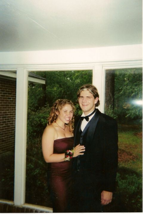 1995 Ford Bronco - A couple dressed for a formal event poses for a photograph.