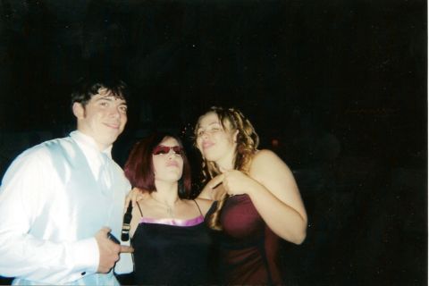 1995 Ford Bronco - Three individuals are captured in a photograph, likely at a formal event.
