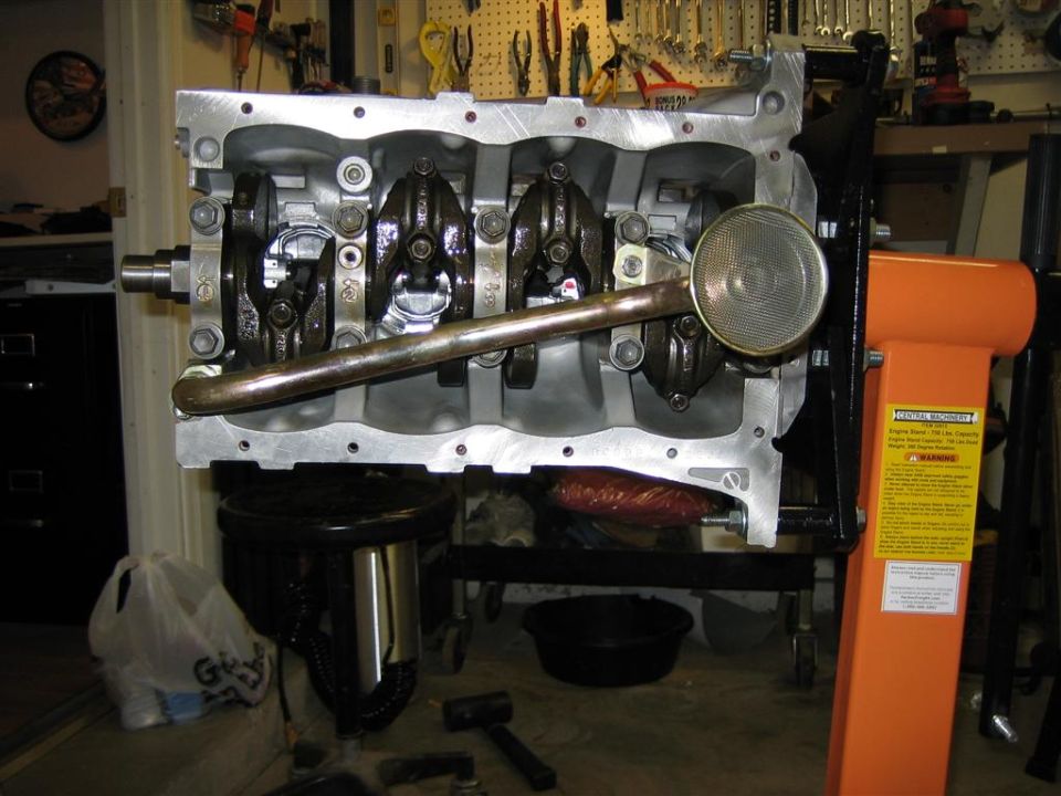 Engine block with crankshaft and oil pump pickup on an engine stand