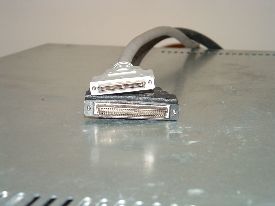 scsi cable that I need has both of these ends....