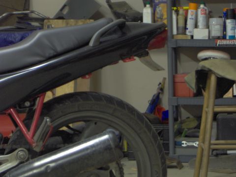 1993 Yamaha Seca II - Close-up of a motorcycle's rear section, showing the seat, tail light, and exhaust.