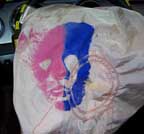 1971 Ford Ranchero - An airbag cover features a split-color skull graphic, with one side pink and the other blue.
